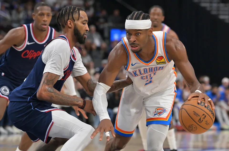 Apr 8, 2026; Inglewood, California, USA; Oklahoma City Thunder guard Shai Gilgeous-Alexander (2) is defended by Los Angeles Clippers forward Derrick Jones Jr. (5) in the second half at Intuit Dome. Mandatory Credit: Jayne Kamin-Oncea-Imagn Images