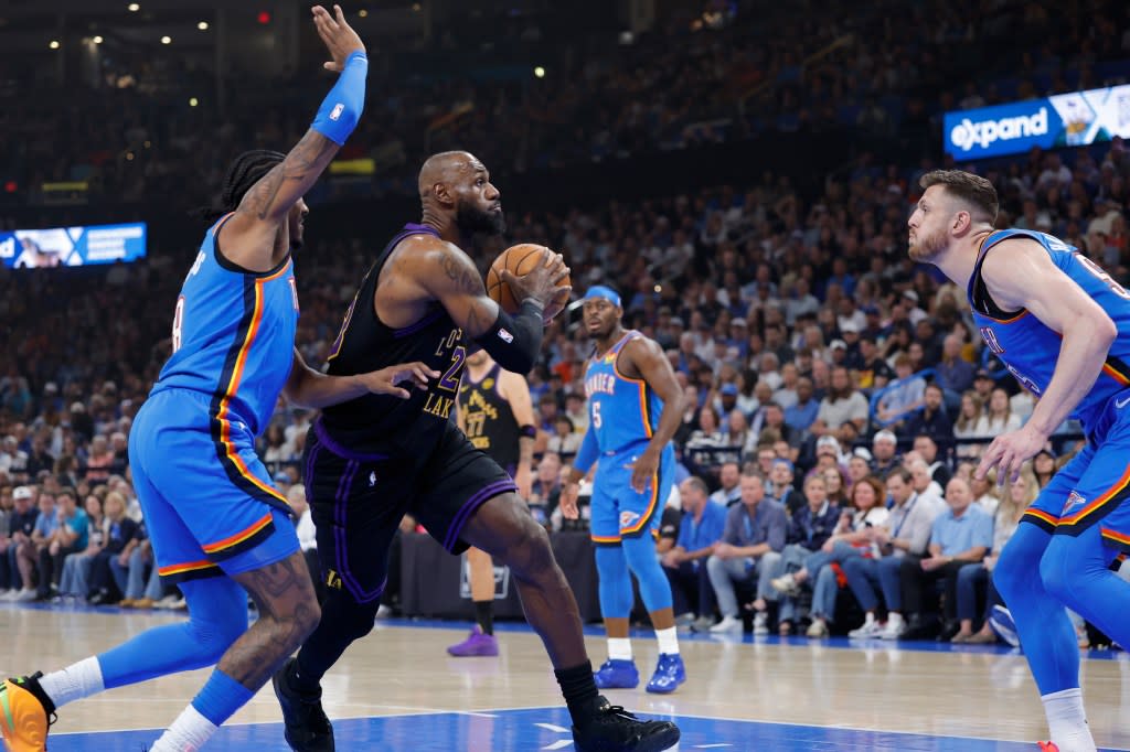 LeBron James drives to the hoop against the Thunder. Alonzo Adams-Imagn Images