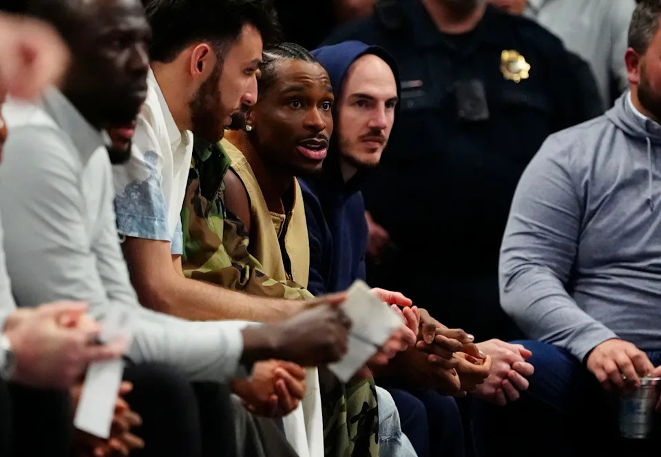 Apr 10, 2026; Denver, Colorado, USA; Oklahoma City Thunder guard Shai Gilgeous-Alexander (2) looks on from the bench in the third quarter against the Denver Nuggets at Ball Arena. Mandatory Credit: Ron Chenoy-Imagn Images