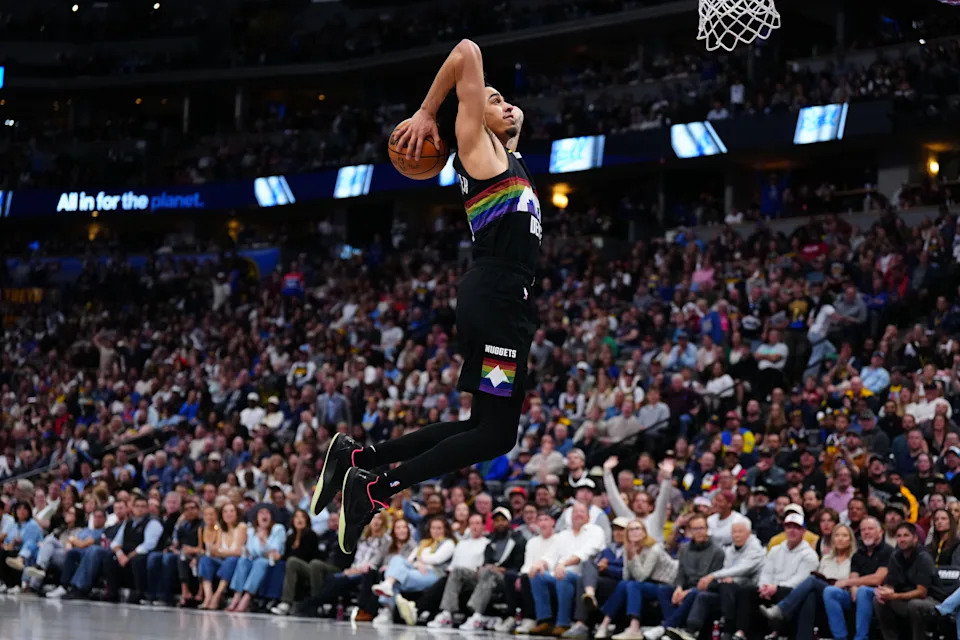 Apr 10, 2026; Denver, Colorado, USA; Denver Nuggets guard Julian Strawther (3) leaps towards the basket in the second half against the Oklahoma City Thunder at Ball Arena. Mandatory Credit: Ron Chenoy-Imagn Images