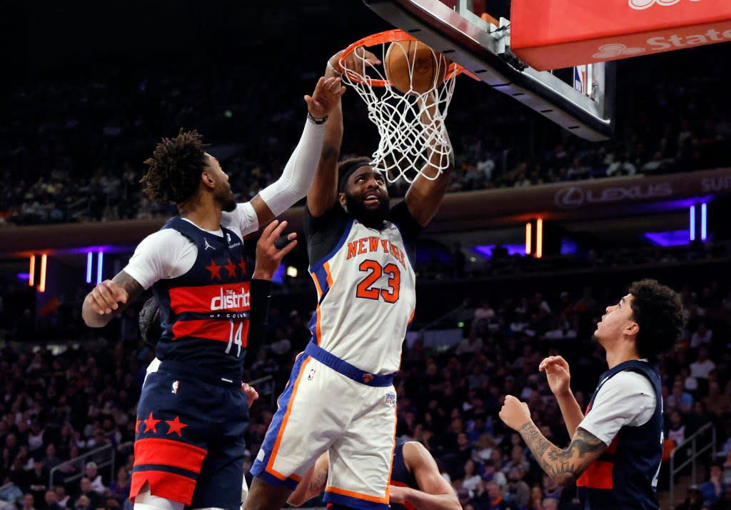 Center Mitchell Robinson of the New York Knicks slams the ball during the second half against the Wizards. Jason Szenes / New York Post
