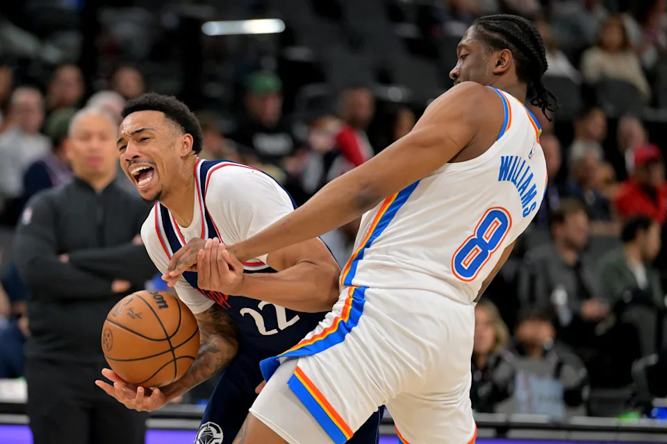 Apr 8, 2026; Inglewood, California, USA; Los Angeles Clippers guard Jordan Miller (22) is fouled by Oklahoma City Thunder guard Jalen Williams (8) in the first half at Intuit Dome. Mandatory Credit: Jayne Kamin-Oncea-Imagn Images