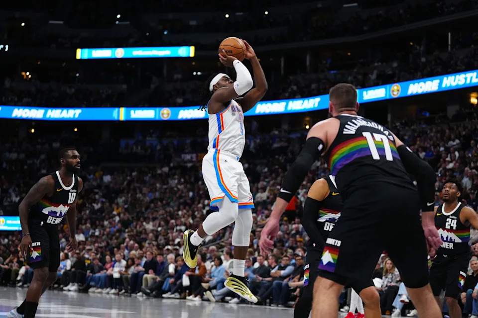 Apr 10, 2026; Denver, Colorado, USA; Oklahoma City Thunder guard Luguentz Dort (5) shoots the ball in the first quarter against the Denver Nuggets at Ball Arena. Mandatory Credit: Ron Chenoy-Imagn Images