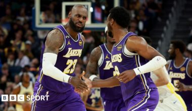 LeBron James and son Bronny on court for LA Lakers against Golden State Warriors