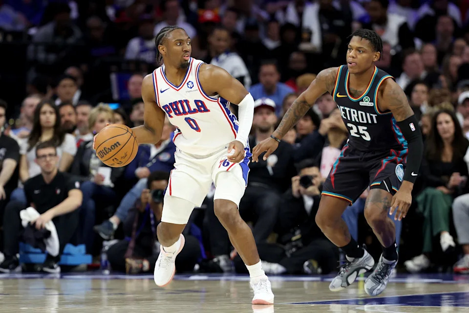PHILADELPHIA, PENNSYLVANIA - APRIL 04: Tyrese Maxey #0 of the Philadelphia 76ers drives against Marcus Sasser #25 of the Detroit Pistons during the second half at Xfinity Mobile Arena on April 04, 2026 in Philadelphia, Pennsylvania. NOTE TO USER: User expressly acknowledges and agrees that, by downloading and or using this photograph, User is consenting to the terms and conditions of the Getty Images License Agreement. (Photo by Emilee Chinn/Getty Images)