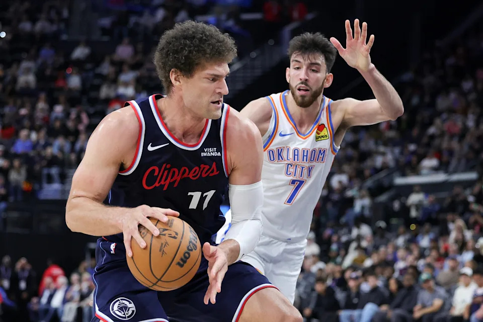 INGLEWOOD, CALIFORNIA - APRIL 08: Brook Lopez #11 of the Los Angeles Clippers drives against Chet Holmgren #7 of the Oklahoma City Thunder during the first half of an NBA game at Intuit Dome on April 08, 2026 in Inglewood, California. NOTE TO USER: User expressly acknowledges and agrees that, by downloading and or using this photograph, User is consenting to the terms and conditions of the Getty Images License Agreement. (Photo by Ryan Sirius Sun/Getty Images)