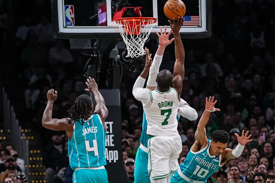 Apr 7, 2026; Boston, Massachusetts, USA; Charlotte Hornets guard Josh Green (10) defends against Boston Celtics guard Jaylen Brown (7) in the second half at TD Garden. Mandatory Credit: David Butler II-Imagn Images