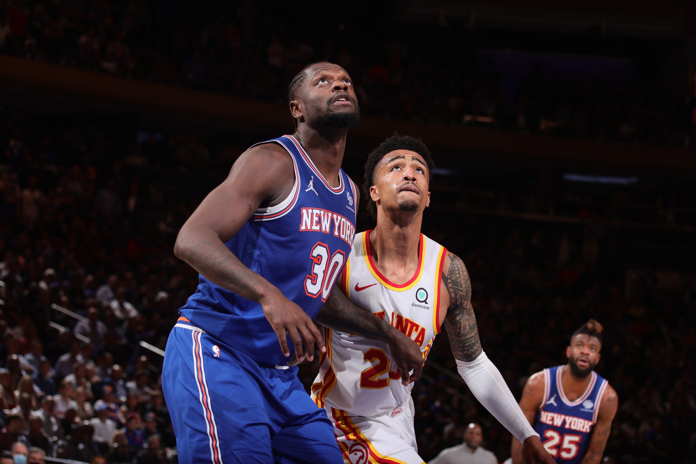 NEW YORK, NY - JUNE 2: Julius Randle #30 of the New York Knicks plays defense on John Collins #20 of the Atlanta Hawks during Round 1, Game 5 of the 2021 NBA Playoffs on June 2, 2021 at Madison Square Garden in New York City, New York. NOTE TO USER: User expressly acknowledges and agrees that, by downloading and or using this photograph, User is consenting to the terms and conditions of the Getty Images License Agreement. Mandatory Copyright Notice: Copyright 2021 NBAE (Photo by Nathaniel S. Butler/NBAE via Getty Images)