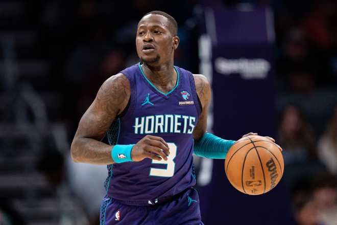 CHARLOTTE, NORTH CAROLINA - JANUARY 20: Terry Rozier #3 of the Charlotte Hornets brings the ball up court /P during their game at Spectrum Center on January 20, 2024 in Charlotte, North Carolina. NOTE TO USER: User expressly acknowledges and agrees that, by downloading and or using this photograph, User is consenting to the terms and conditions of the Getty Images License Agreement. (Photo by Jacob Kupferman/Getty Images)