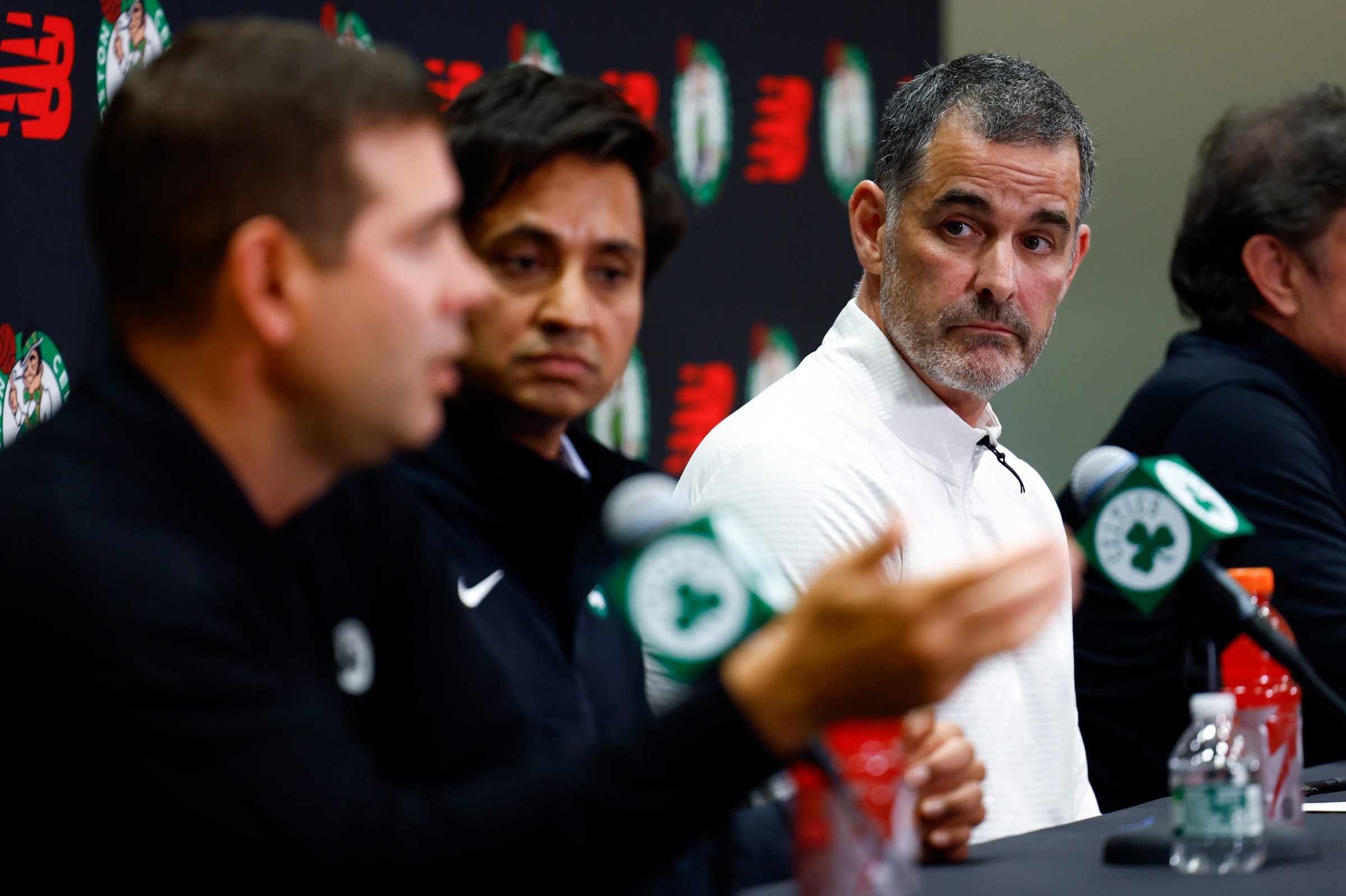 Boston, MA - September 25: Bill Chisholm, the new lead owner and governor of the Boston Celtics, listens as Brad Stevens, president of basketball operations, speaks during an introductory press conference at the Auerbach Center on September 25, 2025 in Boston. (Photo by Danielle Parhizkaran/The Boston Globe via Getty Images)