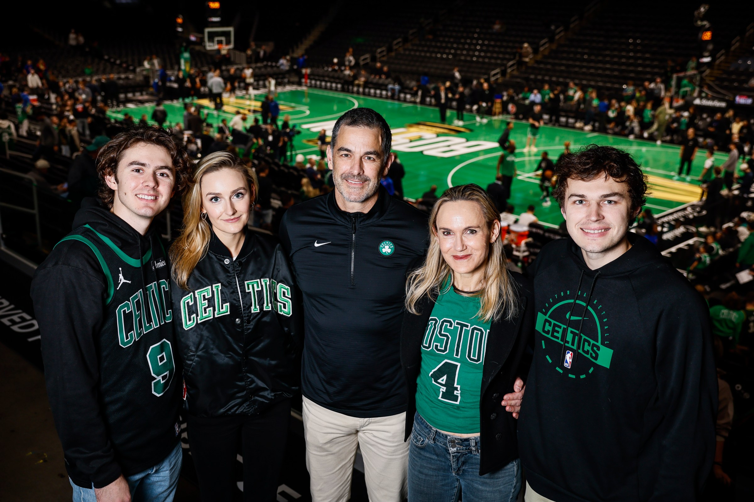 Boston, MA - November 26: Bill Chisholm, the new owner of the Boston Celtics, poses with his children Quentin, Aidan, and Will, from left, and his wife, Kimberly Ford Chisholm, at TD Garden before a game against the Detroit Pistons on November 26, 2025. (Photo by Erin Clark/The Boston Globe via Getty Images)
