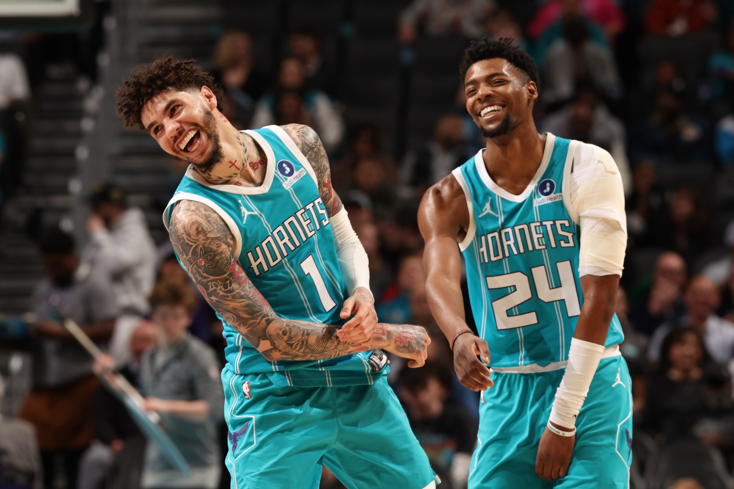 CHARLOTTE, NC - MARCH 3: LaMelo Ball #1 and Brandon Miller #24 of the Charlotte Hornets smiles during the game against the Dallas Mavericks on March 3, 2026 at Spectrum Center in Charlotte, North Carolina. NOTE TO USER: User expressly acknowledges and agrees that, by downloading and or using this photograph, User is consenting to the terms and conditions of the Getty Images License Agreement. Mandatory Copyright Notice: Copyright 2026 NBAE (Photo by Kent Smith/NBAE via Getty Images)