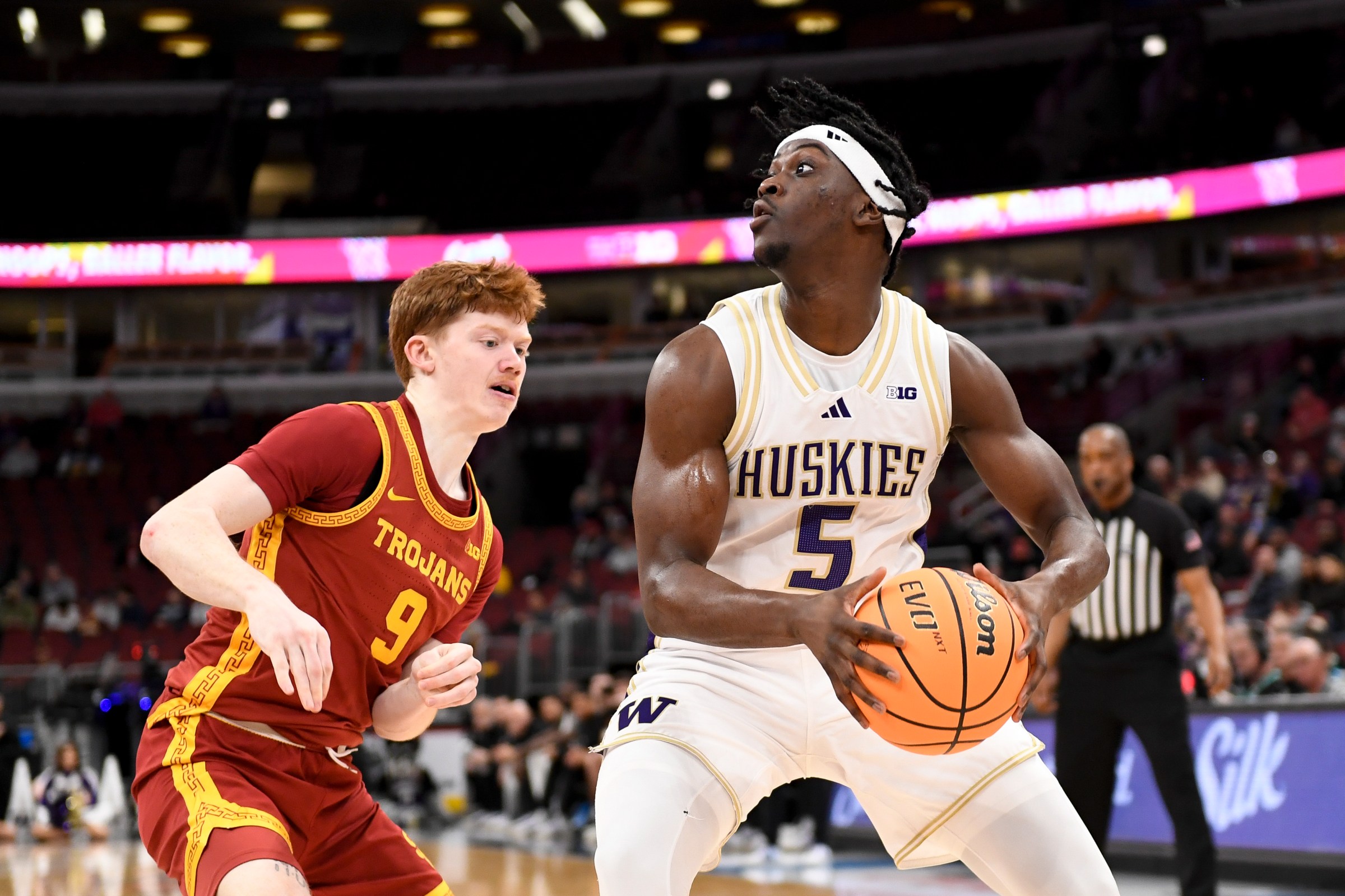 CHICAGO, ILLINOIS - MARCH 11: Washington Huskies guard Zoom Diallo (5) looks to pass while being defended by Southern California Trojans guard Ryan Cornish (9) during the second round at the Big Ten Men’s Basketball Championships at the United Center on March 11, 2026 in Chicago, Illinois. (Photo by Bill Smith/Big Ten/University Images via Getty Images)
