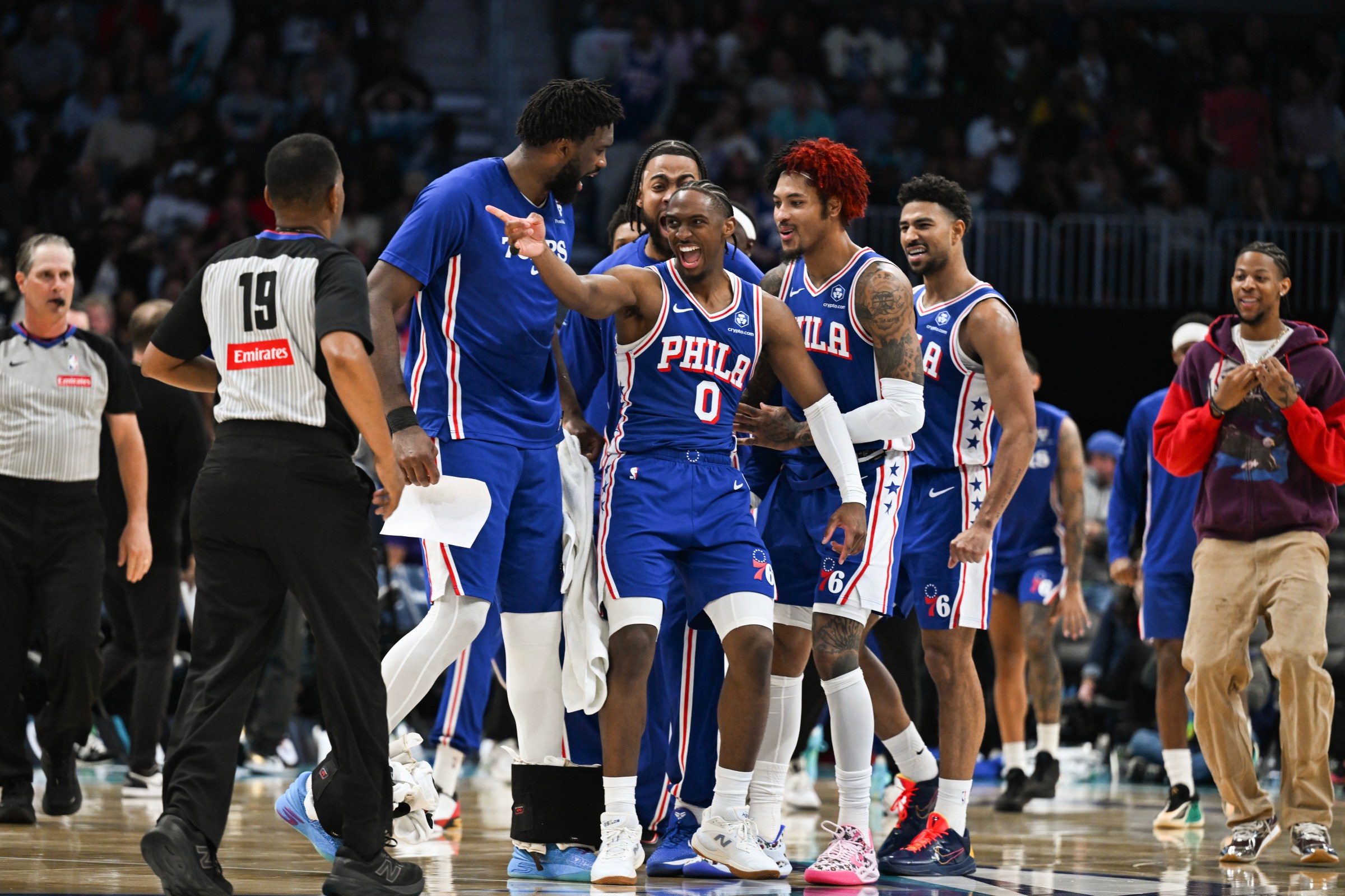 CHARLOTTE, NORTH CAROLINA - MARCH 28: Tyrese Maxey #0 of the Philadelphia 76ers celebrates his shot against the Charlotte Hornets during the second half with teammates Joel Embiid #21, Trendon Watford #12, Kelly Oubre Jr. #9 and Quentin Grimes #5 at Spectrum Center on March 28, 2026 in Charlotte, North Carolina. NOTE TO USER: User expressly acknowledges and agrees that, by downloading and or using this photograph, User is consenting to the terms and conditions of the Getty Images License Agreement. (Photo by Helen McGinnis/Getty Images)