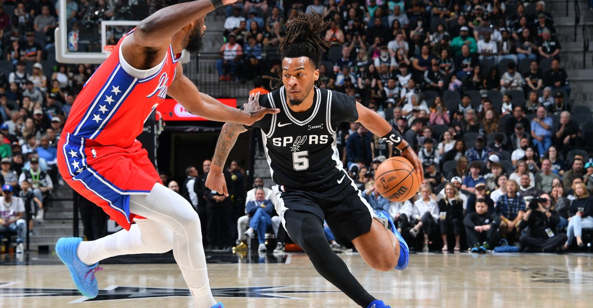 Spurs hold off 76ers for 60th win despite losing Wembanyama to rib injury