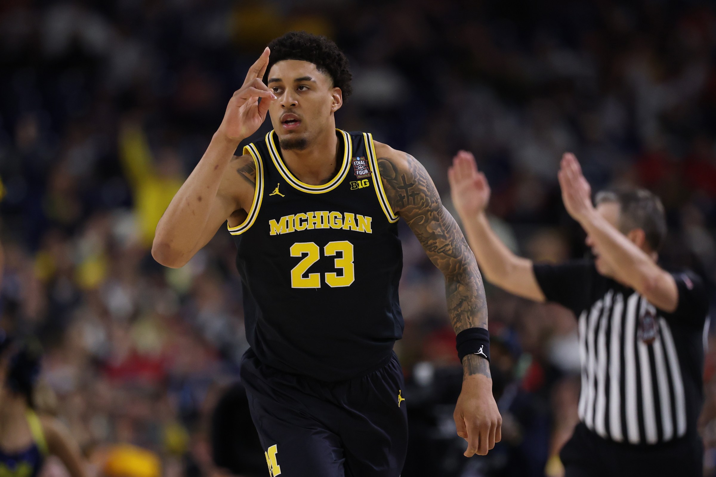 INDIANAPOLIS, INDIANA - APRIL 04: Yaxel Lendeborg #23 of the Michigan Wolverines reacts against the Arizona Wildcats during the second half in the Final Four of the 2026 NCAA Men’s Basketball Tournament at Lucas Oil Stadium on April 04, 2026 in Indianapolis, Indiana. (Photo by Michael Reaves/Getty Images)