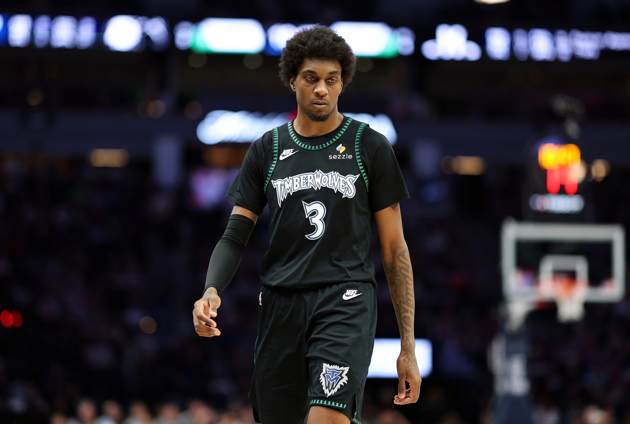 MINNEAPOLIS, MINNESOTA - MARCH 25: Jaden McDaniels #3 of the Minnesota Timberwolves looks on against the Houston Rockets in the third quarter at Target Center on March 25, 2026 in Minneapolis, Minnesota. The Timberwolves defeated the Rockets 110-108 in overtime. NOTE TO USER: User expressly acknowledges and agrees that, by downloading and or using this photograph, User is consenting to the terms and conditions of the Getty Images License Agreement. (Photo by David Berding/Getty Images)