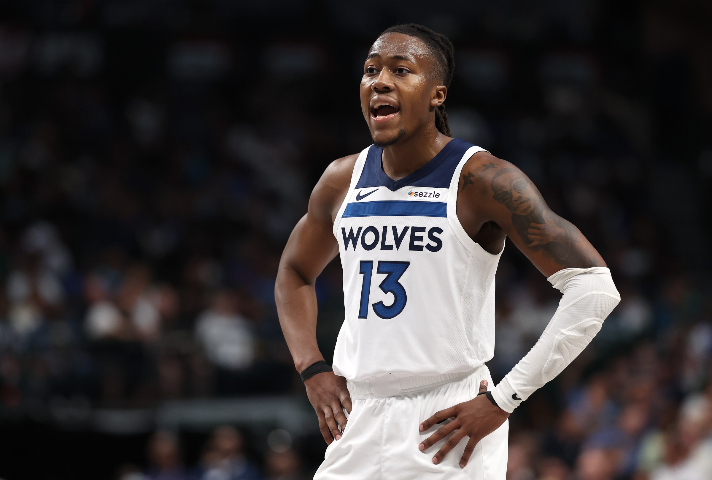 DALLAS, TEXAS - MARCH 30: Ayo Dosunmu #13 of the Minnesota Timberwolves looks on during the third quarter of the game against the Dallas Mavericks at American Airlines Center on March 30, 2026 in Dallas, Texas. NOTE TO USER: User expressly acknowledges and agrees that, by downloading and or using this photograph, user is consenting to the terms and conditions of the Getty Images License Agreement. (Photo by Sam Hodde/Getty Images)