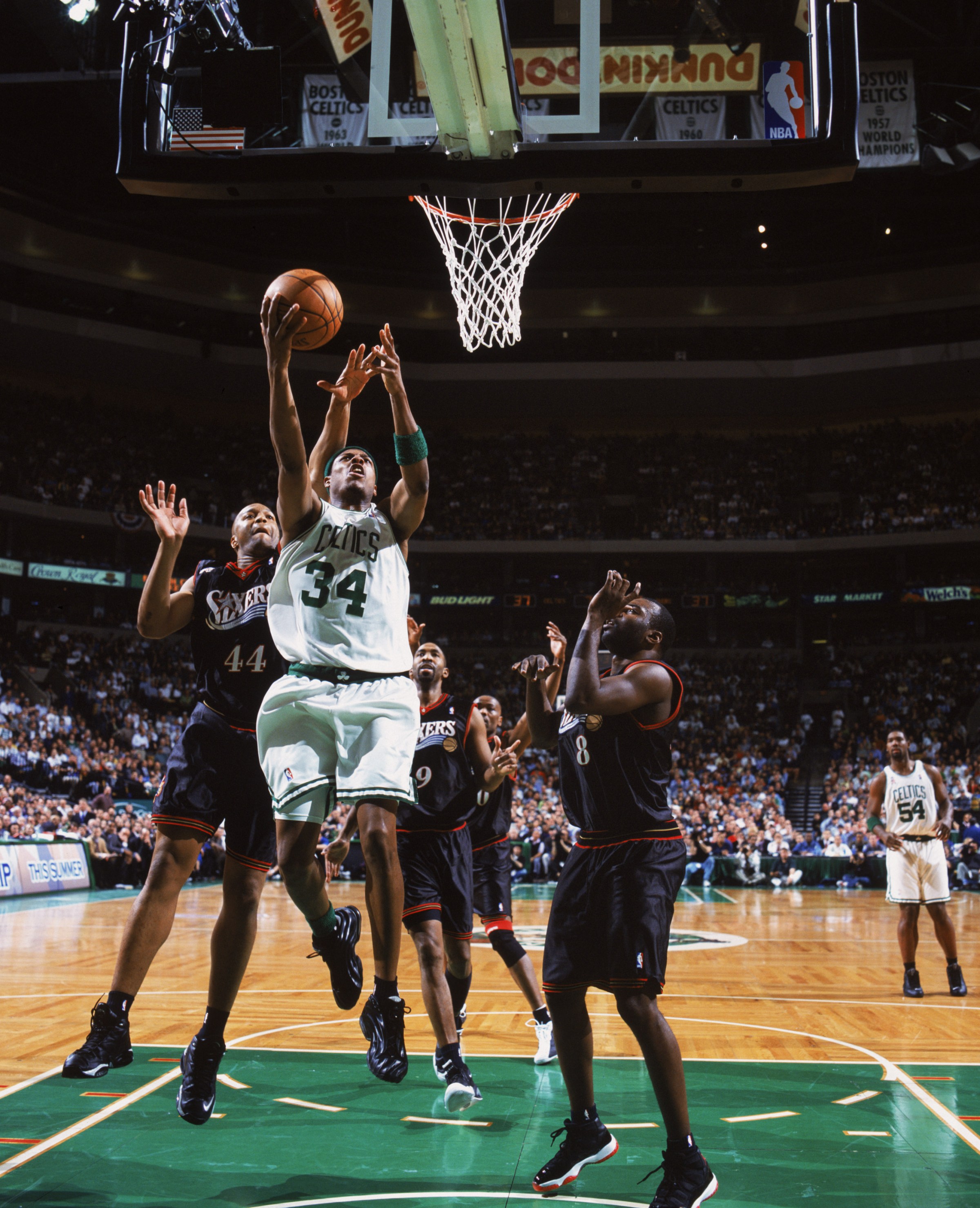 BOSTON - MAY 3: Paul Pierce #34 of the Boston Celtics shoots the ball as Derrick Coleman #44 of the Philadelphia 76ers attempts to block, during game 5 of the Eastern Conference quarterfinals during the 2002 NBA Playoffs at the Fleet Center in Boston, Massachusetts on May 3, 2002. The Celtics won, 120-87. NOTE TO USER: User expressly acknowledges and agrees that, by downloading and/or using this Photograph, User is consenting to the terms and conditions of the Getty Images License Agreement. (Photo by Jesse D. Garrabrant/Getty Images/NBAE)