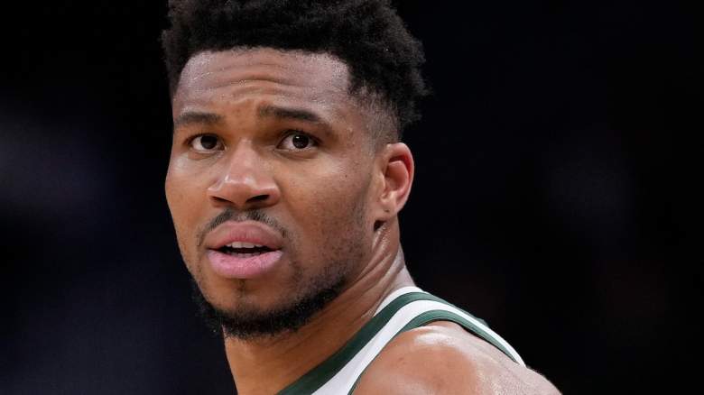 Giannis Antetokounmpo reacts during a game amid viral trade rumors.