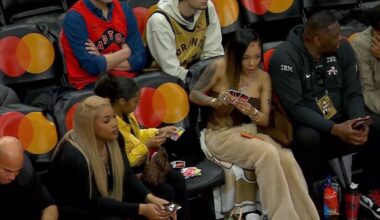 GloRilla spotted playing Uno during Toronto Raptors' playoff-clinching game