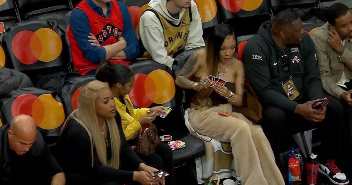 GloRilla spotted playing Uno during Toronto Raptors' playoff-clinching game