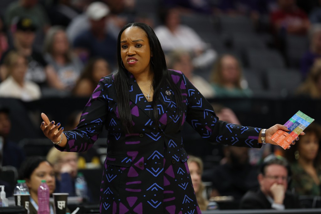 Head coach Amaka Agugua-Hamilton of the Virginia Cavaliers reacts against the TCU Horned Frogs during the fourth quarter in the Sweet Sixteen of the 2026 NCAA Women's Basketball Tournament at Golden 1 Center on March 28, 2026 in Sacramento, California. 