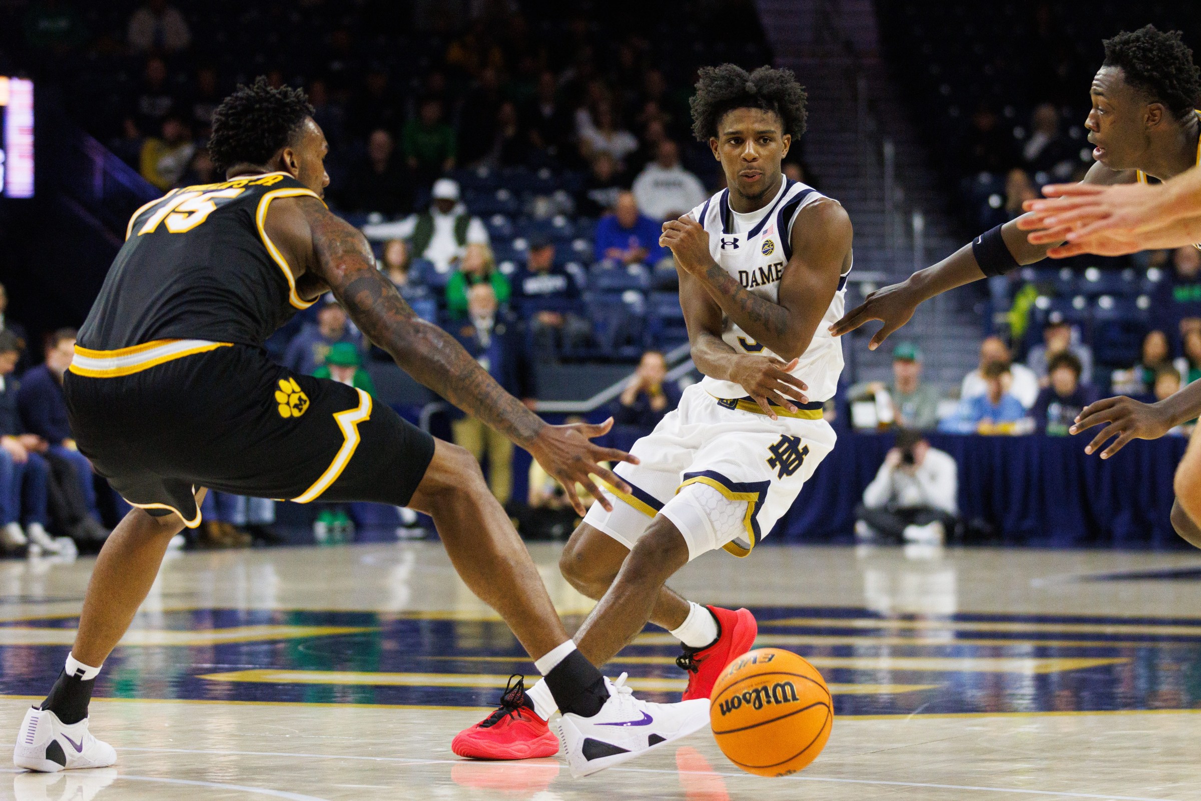 Notre Dame guard Markus Burton, center, passes the ball during a NCAA men’s basketball game against Missouri at Purcell Pavilion on Tuesday, Dec. 2, 2025, in South Bend.