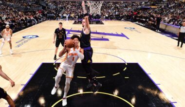Jalen Johnson #1 of the Atlanta Hawks drives to the basket against Luka Doncic #77 of the Los Angeles Lakers at Crypto.com Arena on January 13, 2026.