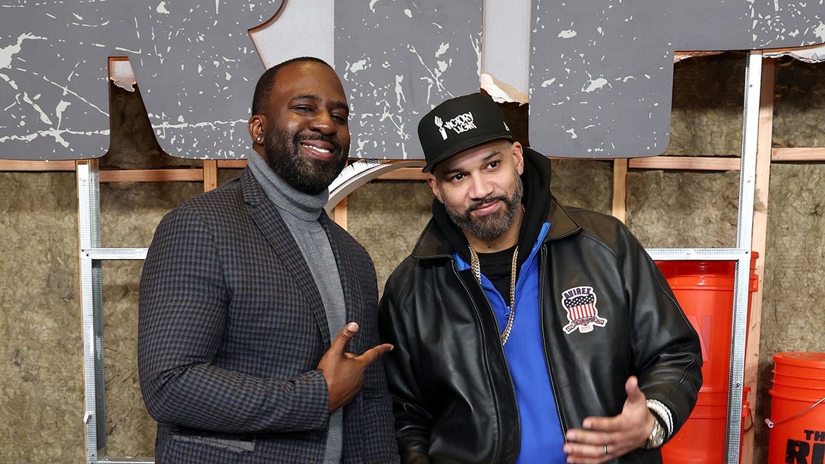 Kazeem Famuyide and The Kid Mero standing at Netflix's The Rip New York premiere