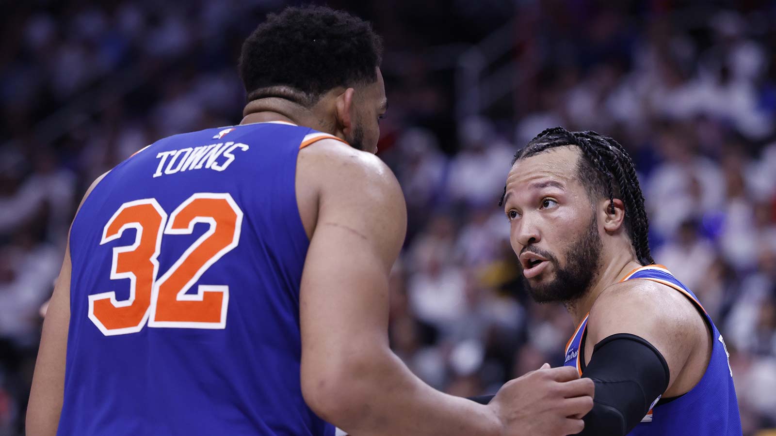 May 1, 2025; Detroit, Michigan, USA; New York Knicks guard Jalen Brunson (11) talks to center Karl-Anthony Towns (32) in the second half against the Detroit Pistons during game six of first round for the 2024 NBA Playoffs at Little Caesars Arena. Mandatory Credit: Rick Osentoski-Imagn Images