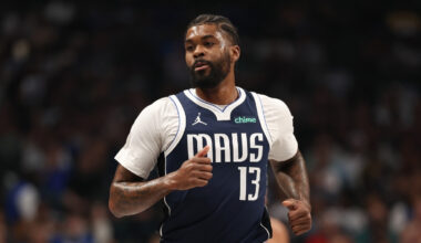 Naji Marshall #13 of the Dallas Mavericks runs up the court during a home game against the Golden State Warriors at American Airlines Center.