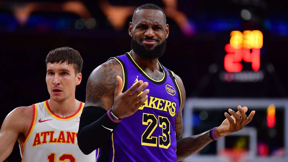 LeBron James reacting to a foul call during a basketball game at Crypto.com Arena