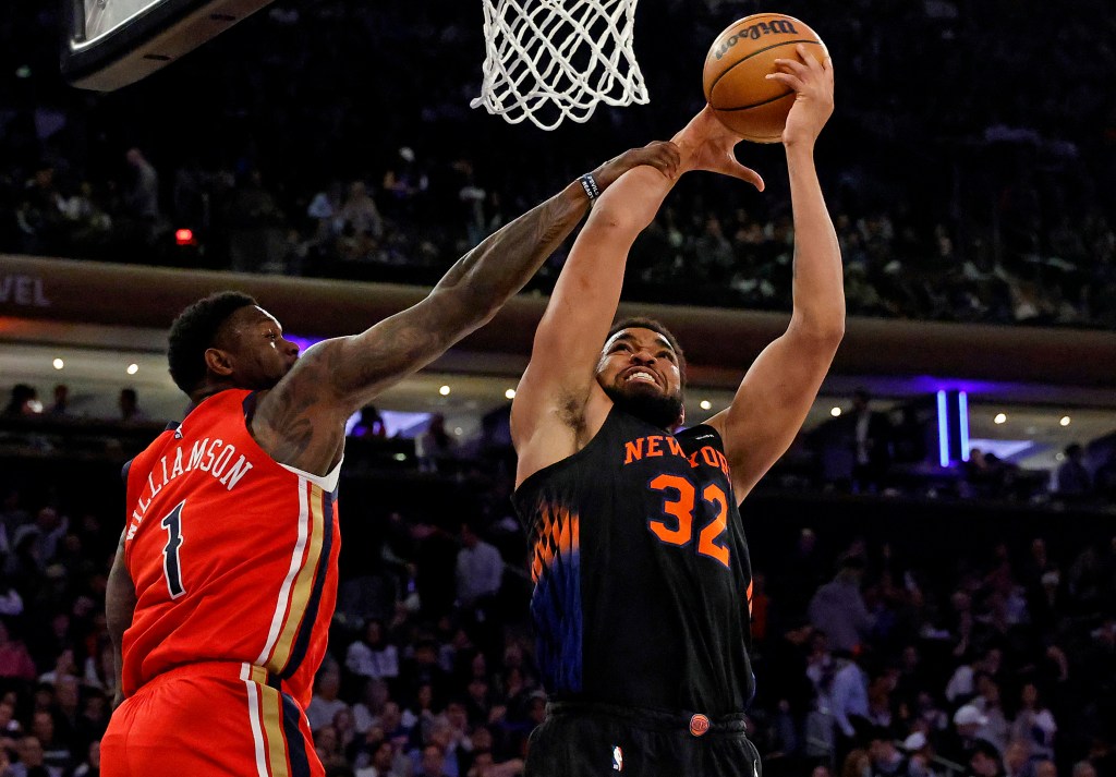 Karl-Anthony Towns goes up for a shot as New Orleans Pelicans forward Zion Williamson defends during the third quarter at Madison Square Garden in New York, New York, USA, Tuesday, March 24, 2026.