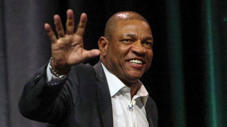 Boston Celtics head coach receiving the basketball award during the Tradition sports awards program at TD Garden.