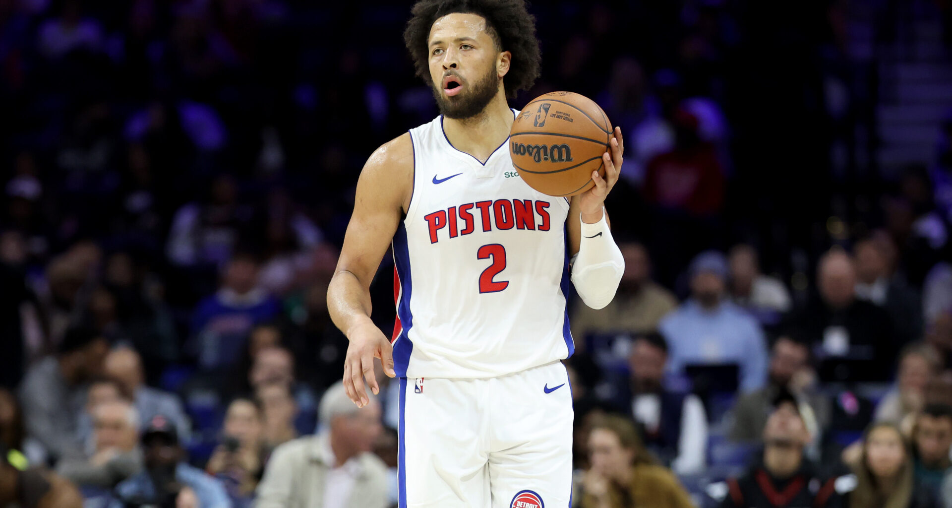 Cade Cunningham dribbles the ball up the court during a Detroit Pistons game in March 2025.