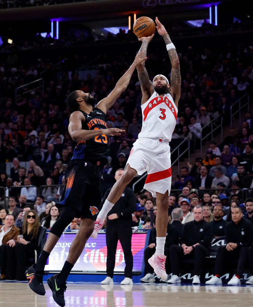 Brandon Ingram puts up a shot as New York Knicks guard Mikal Bridges defends during the third quarter in a game against the Toronto Raptors at Madison Square Garden in New York, New York, USA, Friday, April 10, 2026.