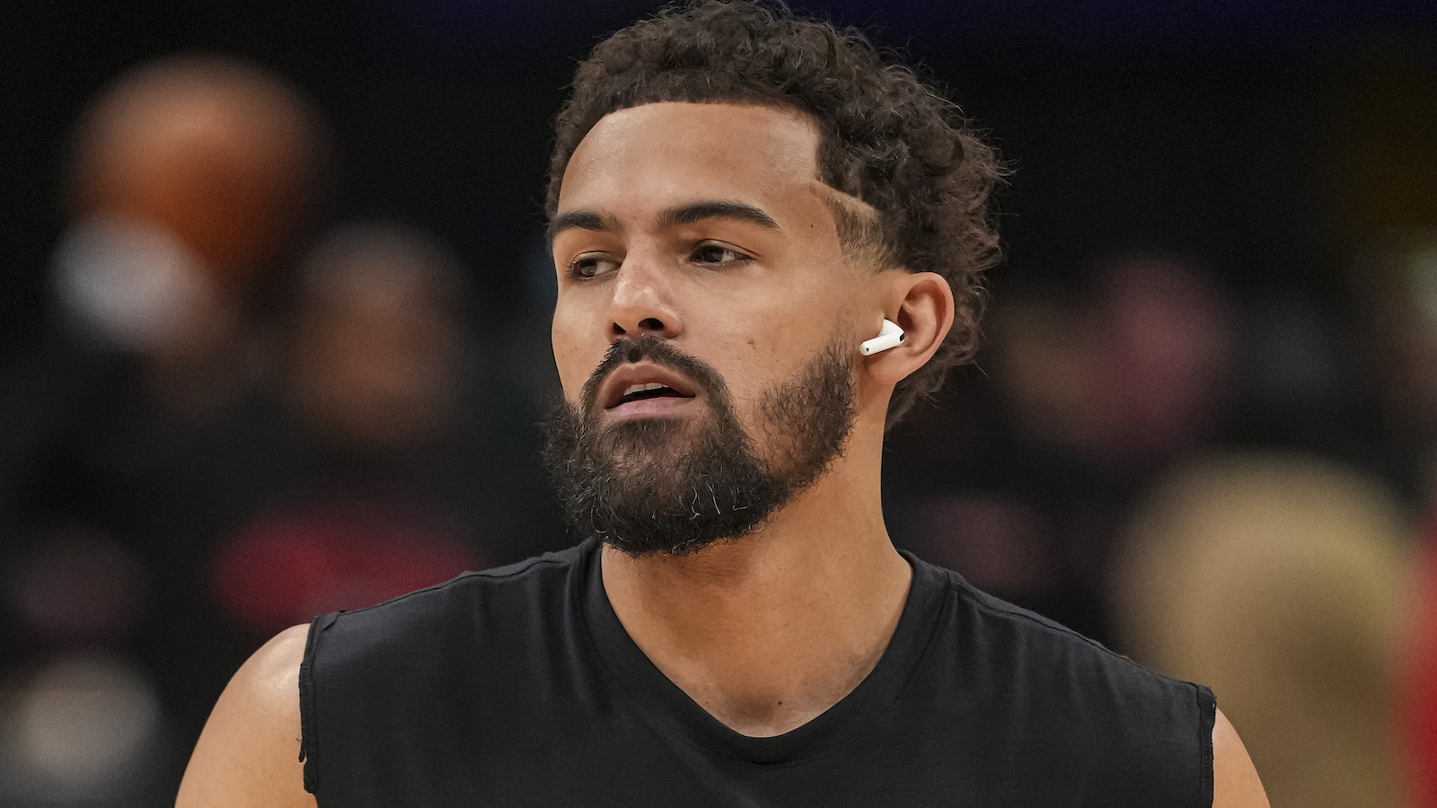 Trae Young looking on