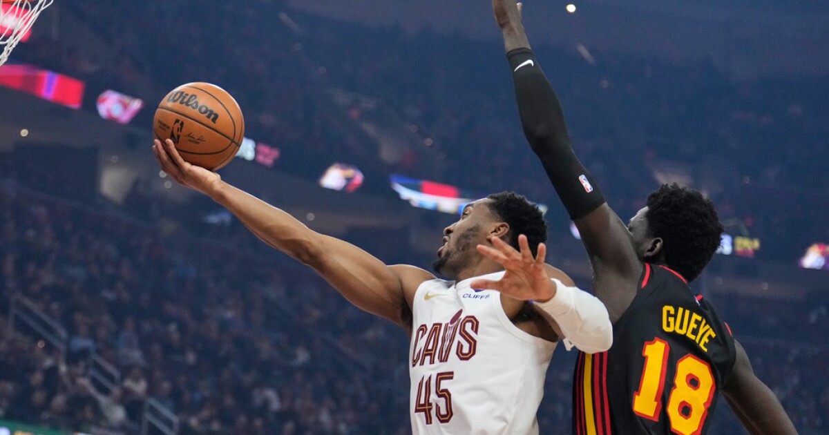 Donovan Mitchell and Evan Mobley help Cavaliers hold off Hawks 122-116