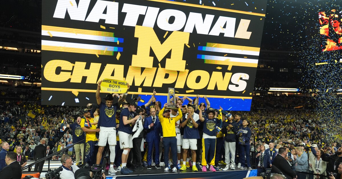 Michigan muscles its way to program's 2nd NCAA basketball title, beating UConn