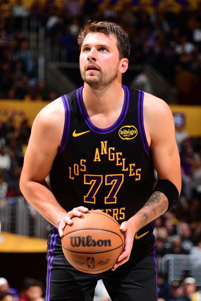 Luka Doncic #77 of the Los Angeles Lakers shoots a free throw.