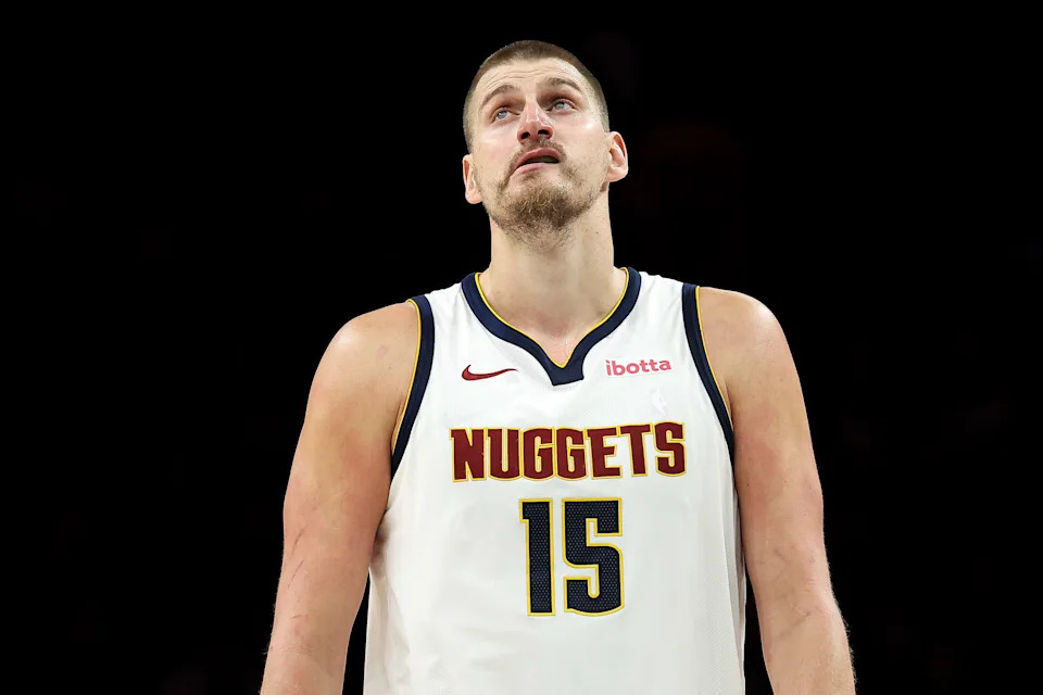Denver Nuggets center Nikola Jokic (15) looks on during the second half of Game 6 of a first-round NBA basketball playoffs series against the Minnesota Timberwolves, Thursday, April 30, 2026, in Minneapolis. (AP Photo/Matt Krohn)