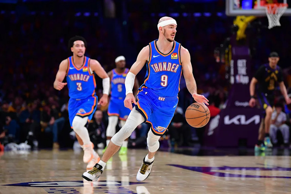 May 11, 2026; Los Angeles, California, USA; Oklahoma City Thunder guard Alex Caruso (9) moves the ball down court against the Los Angeles Lakers during the second half in game four of the second round of the 2026 NBA Playoffs at Crypto.com Arena. Mandatory Credit: Gary A. Vasquez-Imagn Images