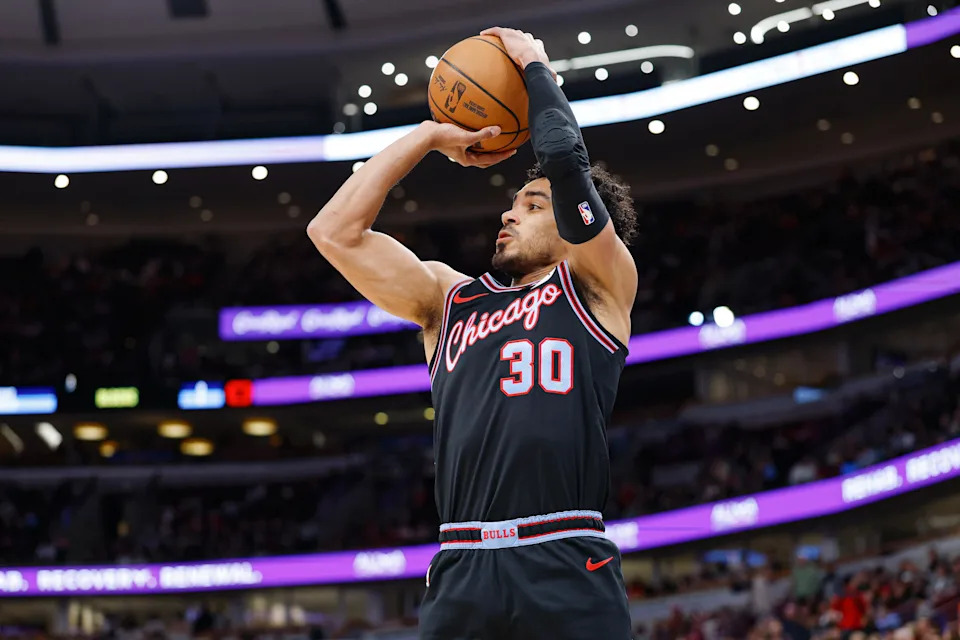 Apr 5, 2026; Chicago, Illinois, USA; Chicago Bulls guard Tre Jones (30) shoots against the Phoenix Suns during the first half at United Center. Mandatory Credit: Kamil Krzaczynski-Imagn Images