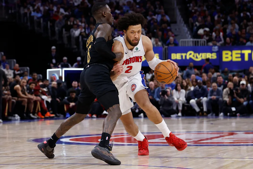 May 7, 2026; Detroit, Michigan, USA; Detroit Pistons guard Cade Cunningham (2) dribbles defended by Cleveland Cavaliers guard Dennis Schroder (8) in the second half during game two of the second round of the 2026 NBA Playoffs at Little Caesars Arena. Mandatory Credit: Rick Osentoski-Imagn Images