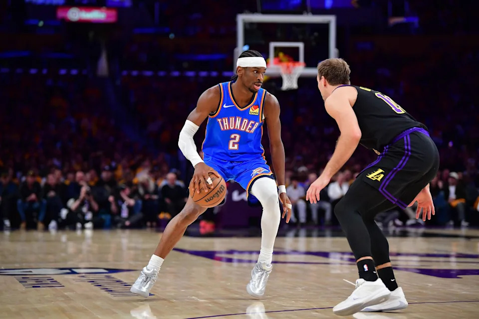 May 11, 2026; Los Angeles, California, USA; Oklahoma City Thunder guard Shai Gilgeous-Alexander (2) controls the ball against Los Angeles Lakers guard Luke Kennard (10) during the second half in game four of the second round of the 2026 NBA Playoffs at Crypto.com Arena. Mandatory Credit: Gary A. Vasquez-Imagn Images