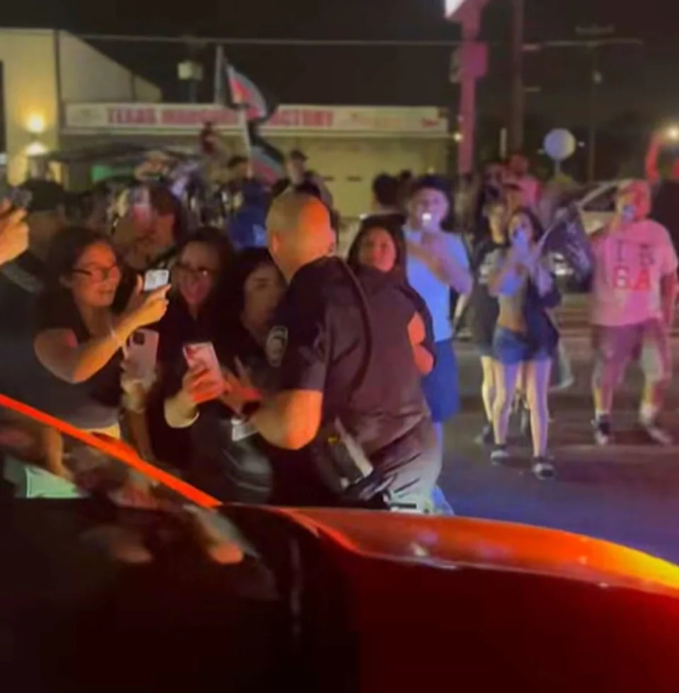 A video depicting officers from the San Antonio Police Department carrying out multiple arrests on celebrating Spurs fans after the team's Wednesday night win against the Minnesota Timberwolves has gone viral on social media. (Courtesy of John Doee via Facebook)