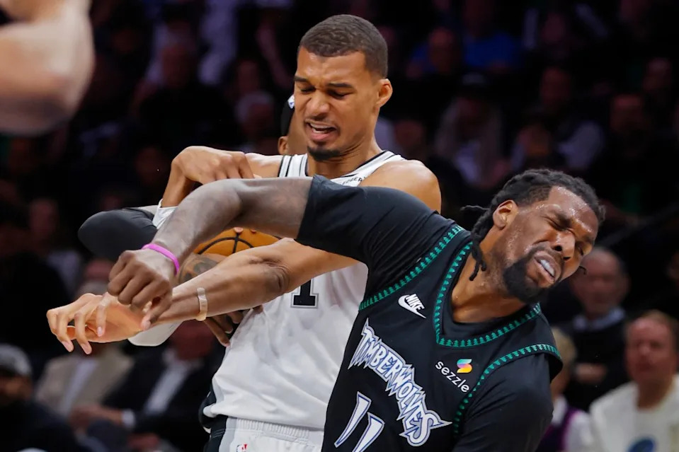 Spurs center Victor Wembanyama commits a flagrant foul against Timberwolves center Naz Reid during Game 4. Bruce Kluckhohn-Imagn Images