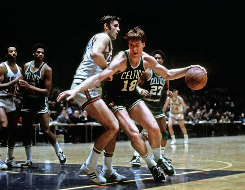 Unknown date 1970; New York, NY, USA; FILE PHOTO; Boston Celtics center Dave Cowens (18) drives to the basket against New York Knicks forward Dave DeBusschere (22) at Madison Square Garden. Mandatory Credit: Photo By Manny Rubio-USA TODAY Sports © Copyright Manny Rubio