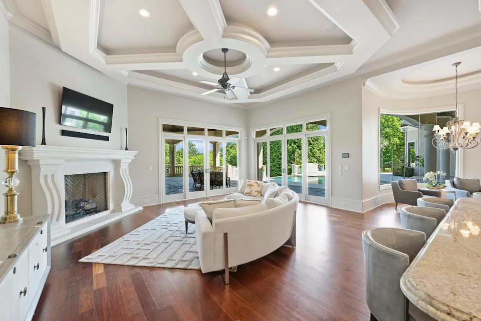 The mansion includes hardwood flooring throughout, Michelle Rhyne, global real estate adviser with Premier Sotheby’s Lake Norman office said in a statement.